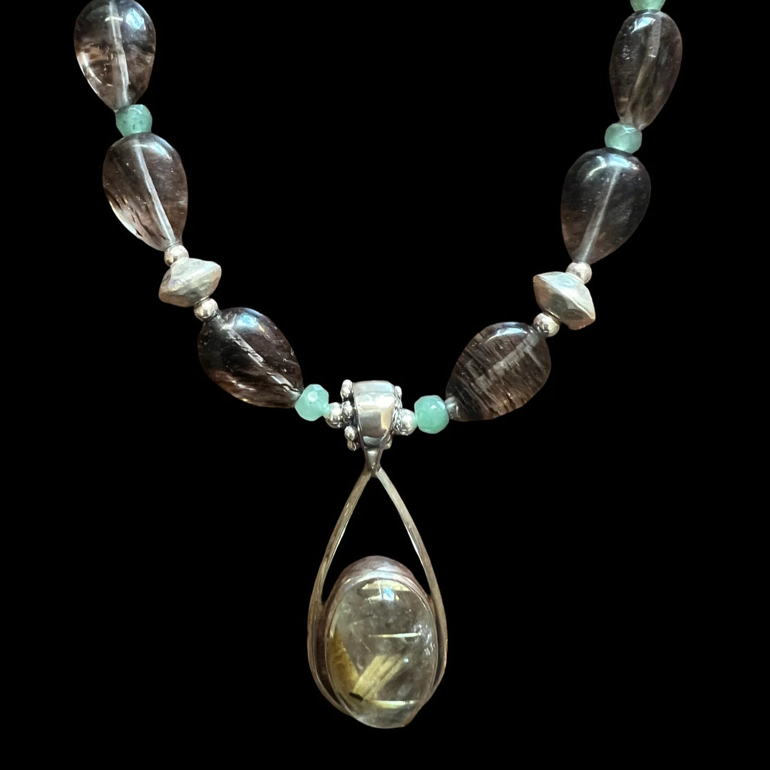 Rutilated Quartz with Smoky Quartz TS83