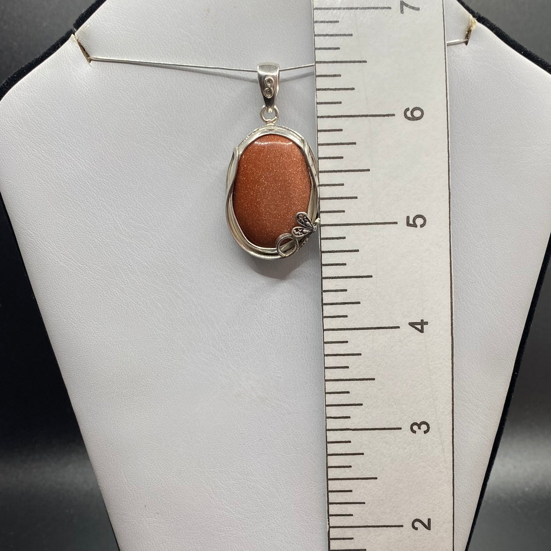 Goldstone Oval SS Pendant-TM140